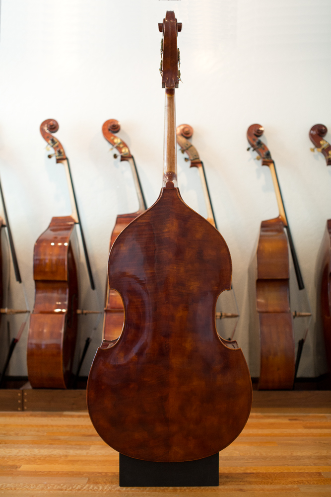 carved upright bass back